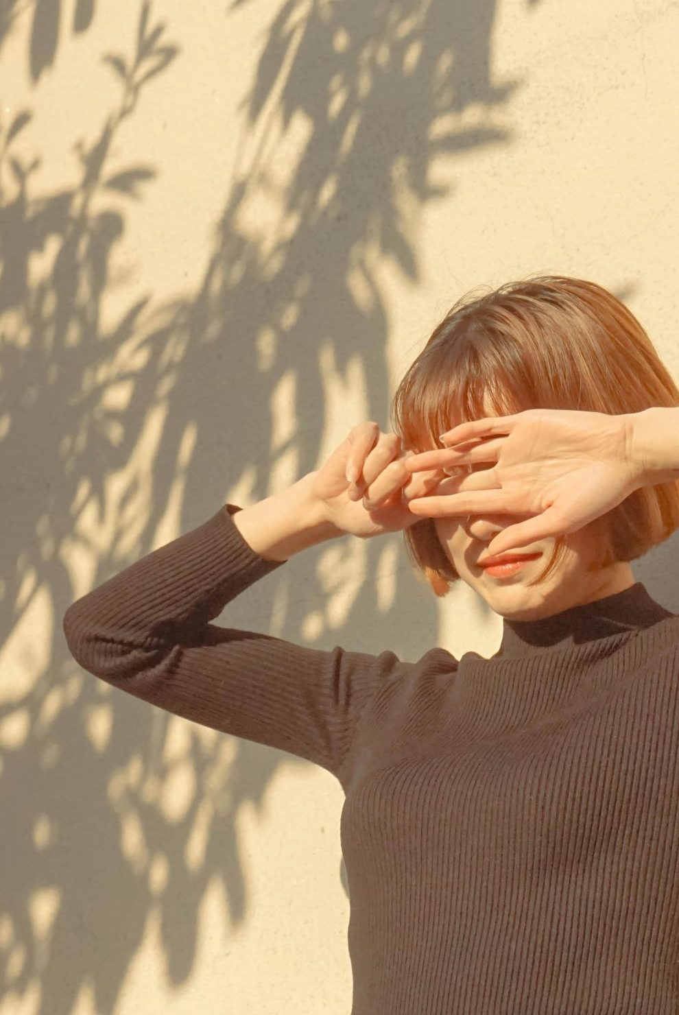 Photo of woman in sunlight by Maggie Zhan